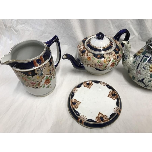 236 - Selection of teapots, Corona Ware, two and three piece sets and a Royal Doulton Autumn Glory teapot.