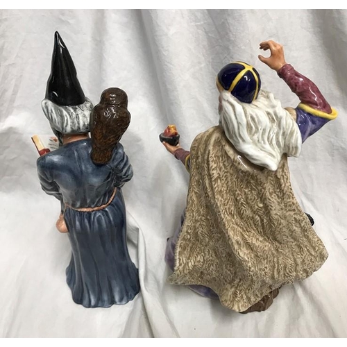 239 - Two Royal Doulton figures, The Sorcerer HN4252, 24cms h and The Wizard HN2877, 25cms h.