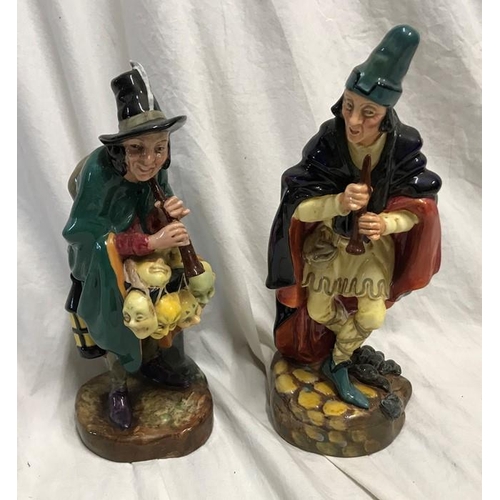 241 - Two Royal Doulton figures, The Pied Piper HN2102, 23cms h and The Mask Seller HN2103, 22cms h.