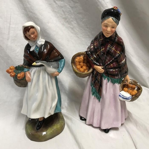 245 - Two Royal Doulton figurines. The Orange Lady HN1759, 21.5cms h and Country Lass HN1991, 20cms h.