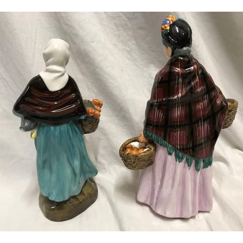 245 - Two Royal Doulton figurines. The Orange Lady HN1759, 21.5cms h and Country Lass HN1991, 20cms h.