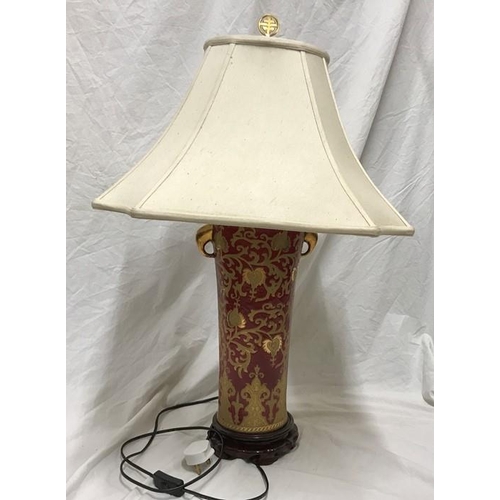 262 - Chinese pottery tall table lamp, gilt and red, floral and leaf design, brass finial with a cream col... 