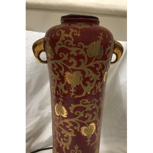 262 - Chinese pottery tall table lamp, gilt and red, floral and leaf design, brass finial with a cream col... 