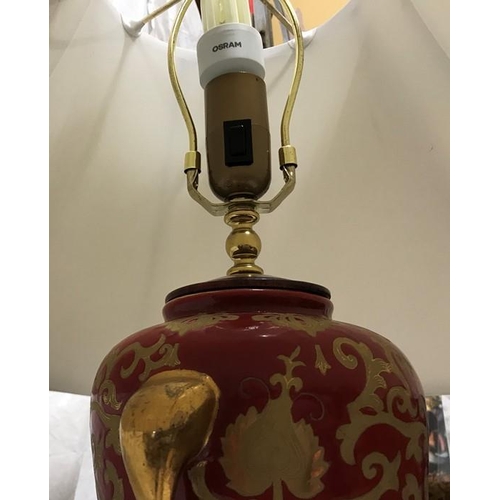 262 - Chinese pottery tall table lamp, gilt and red, floral and leaf design, brass finial with a cream col... 