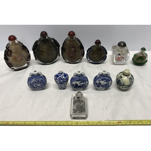 264 - Collection of 12 decorative glass and blue & white pottery Chinese scent bottles, 12.5cms tallest.