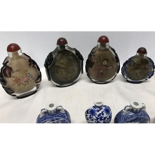 264 - Collection of 12 decorative glass and blue & white pottery Chinese scent bottles, 12.5cms tallest.