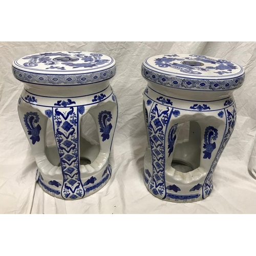 267 - Pair of Chinese blue and white pottery stools, floral pattern. 40 h x 30cms w.