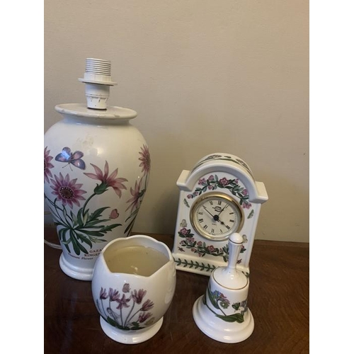 294 - Portmeirion Botanic Garden table lamps 21cms h with a clock, a candle and a bell.