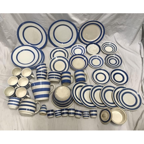 297 - Selection of Blue and white Cornish Ware. Dinner plates 25cms and 23cms w, various saucers, mugs, cu... 