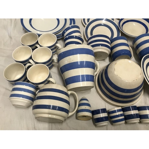 297 - Selection of Blue and white Cornish Ware. Dinner plates 25cms and 23cms w, various saucers, mugs, cu... 