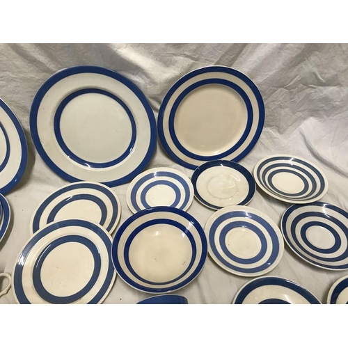 297 - Selection of Blue and white Cornish Ware. Dinner plates 25cms and 23cms w, various saucers, mugs, cu... 