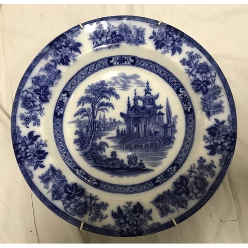 302 - Doulton Burslem blue and white Madras pattern meat plate 40 w x 32cms and a matching plate 26cms w t... 