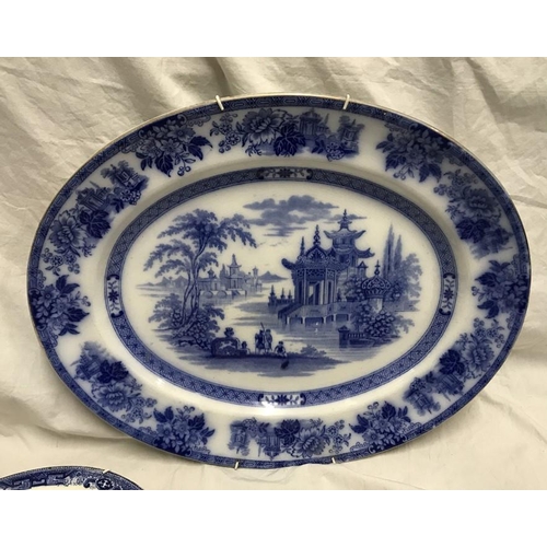 302 - Doulton Burslem blue and white Madras pattern meat plate 40 w x 32cms and a matching plate 26cms w t... 