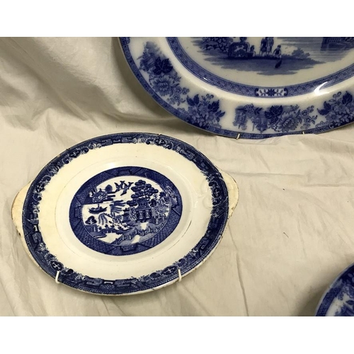 302 - Doulton Burslem blue and white Madras pattern meat plate 40 w x 32cms and a matching plate 26cms w t... 