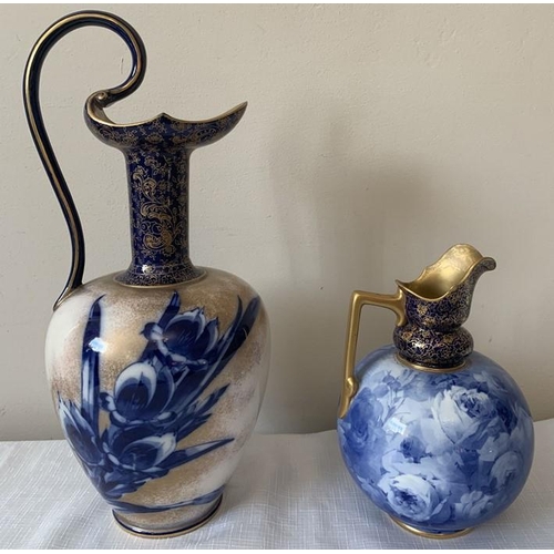 305 - Two Doulton Burslem blue and gilt vases. Tallest with scroll handle 36 cms h.