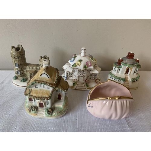 319 - Ceramics to include Coalport Parasol House and other houses two of which are money boxes and a bag m... 