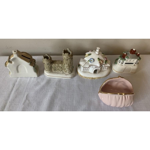 319 - Ceramics to include Coalport Parasol House and other houses two of which are money boxes and a bag m... 