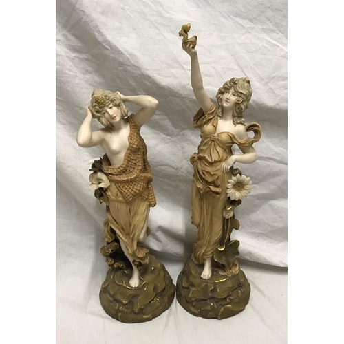 320 - Pair of pottery figurines, Royal Dux style, sea maidens, semi nude, 33cms h and 41cms h.