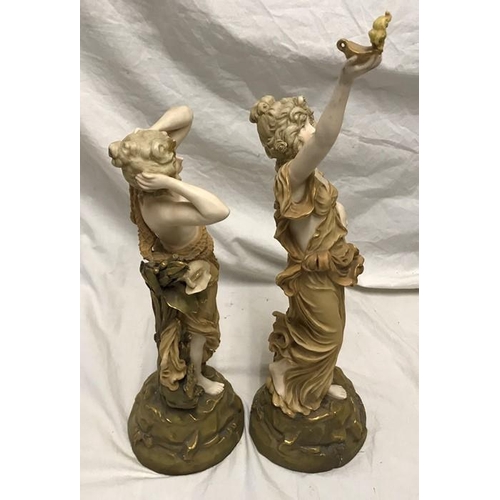 320 - Pair of pottery figurines, Royal Dux style, sea maidens, semi nude, 33cms h and 41cms h.