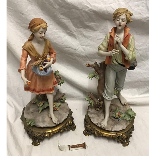 321 - Benacchio Italian porcelain pair of figurines, young man with flute and girl with fruit, gilt metal ... 