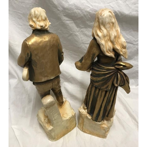 322 - Pair of continental porcelain figurines. Gilt and ivorine effect, street musicians, 34cms h.