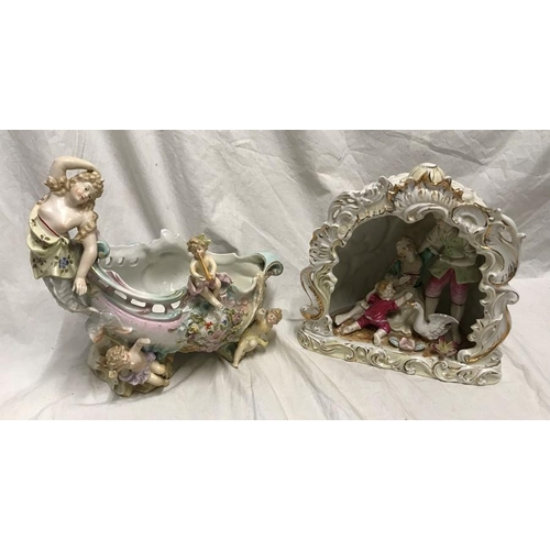 328 - Continental Italian pottery figures. Couple with boy and goose under a archway 22cms h c 23cms w and... 