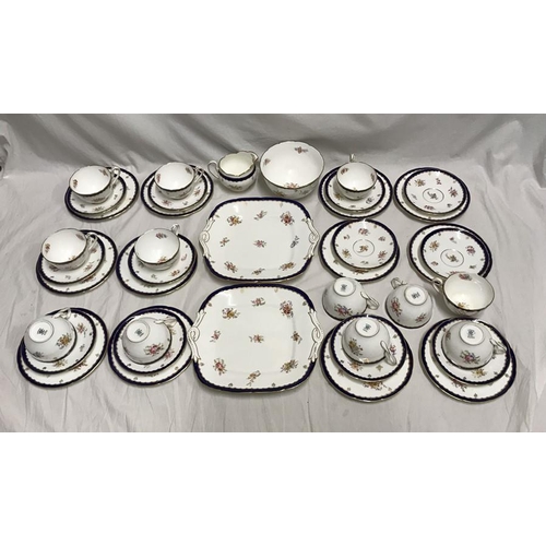 363 - Coalport part tea services. 40 pieces. 12 cups saucers and side plates, 2 cake plates, milk jug and ... 