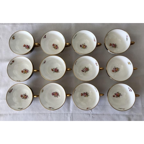 366 - A Coalport tea service, 12 saucers, 12 plates, 12 cups, 1 sugar bowl and 2 cake plates.