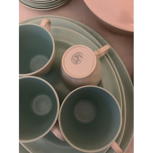 375 - A Poole pottery twin-tone part dinner and tea service to include 5 x 24cms d bowls, 4 x 23cms plates... 