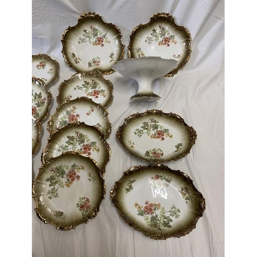 377 - A 17 piece French pottery made for Alfred B Pearce, 39 Ludgate Hill, London. Decorative floral patte... 