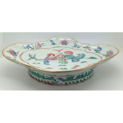 388 - An 18thC Chinese famille rose footed dish, 27 x 22cms decorated with 3 people and floral border. Als... 