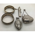 Silver napkin rings, Birmingham 1916 handbag on chain, marked .925, scent bottle with floral decorat... 