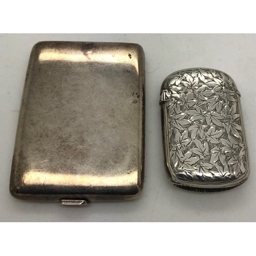 52 - Hallmarked silver vesta case with leaf engraving, Birmingham 1894, maker George Unite and vacant car... 