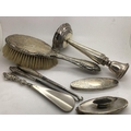 Various hallmarked silver items including candlestick, hairbrush, nail buffers, two silver handled b... 