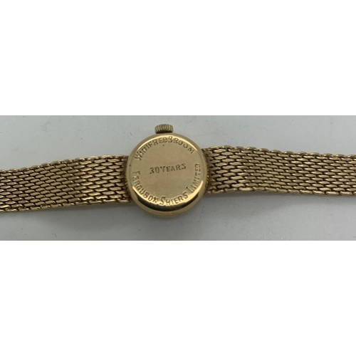 66 - A 9ct gold ladies Tissot wristwatch inscribed to rear Winifred Broom, Ferguson Shiers Limited, 30 ye... 