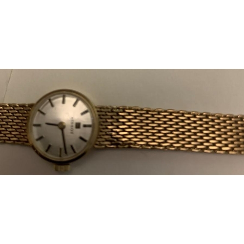 66 - A 9ct gold ladies Tissot wristwatch inscribed to rear Winifred Broom, Ferguson Shiers Limited, 30 ye... 