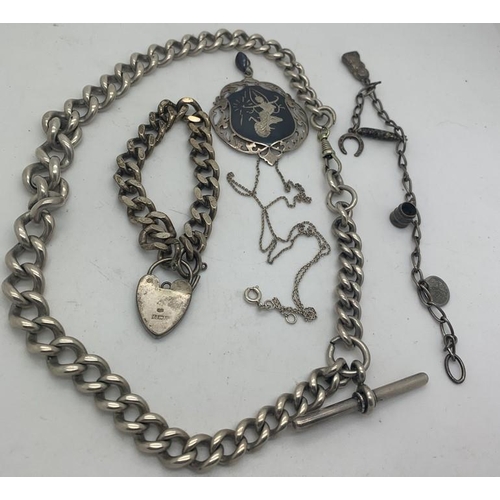 696 - Heavy hallmarked silver watch chain with T bar, hallmarked silver bracelet with padlock, charm brace... 