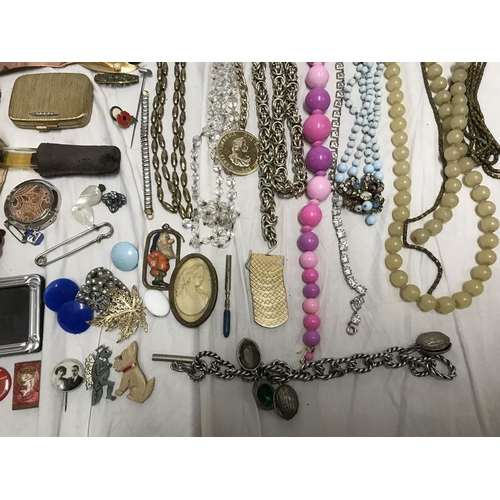 701 - Costume jewellery, selection of necklaces, earrings, brooches, hair combs, pin badges, bracelets, sc... 