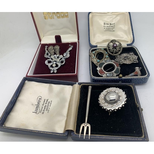 705 - Various mainly white metal jewellery to include pickle fork, brooch, filigree brooch set with 5 red ... 