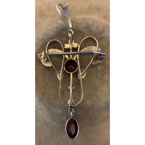 706 - A 9ct gold art nouveau drop pendant and brooch set with seed pearls and red stones. 2.,6gms. 4.5cms ... 