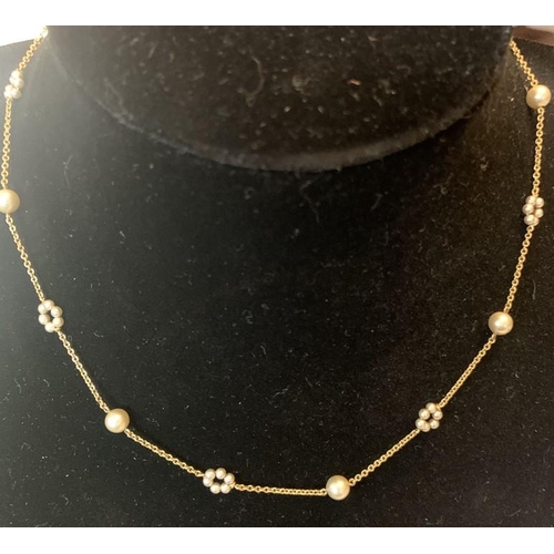 707 - A 9ct gold and seed pearl chain necklace 38cms l. 3.5gms in contemporary silk lined box.