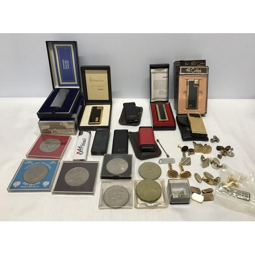 717 - Collection of gents cufflinks, commemorative coins and gas fuelled lighters to include Colibri etc.