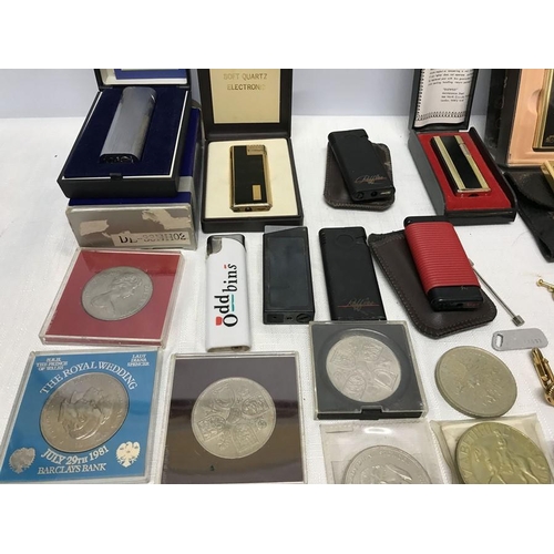 717 - Collection of gents cufflinks, commemorative coins and gas fuelled lighters to include Colibri etc.