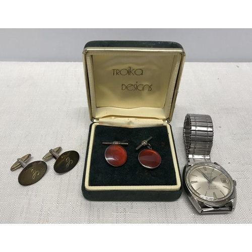 718 - Two pairs of Gents silver cufflinks, one pair hallmarked T and D Ltd Birmingham 1980. One pair 925 s... 