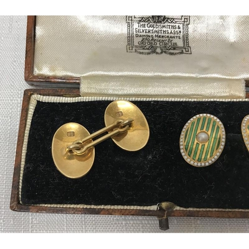 719 - Cased pair of gents 18ct gold cufflinks with green and white enamel set with pearl. 9.9gms.