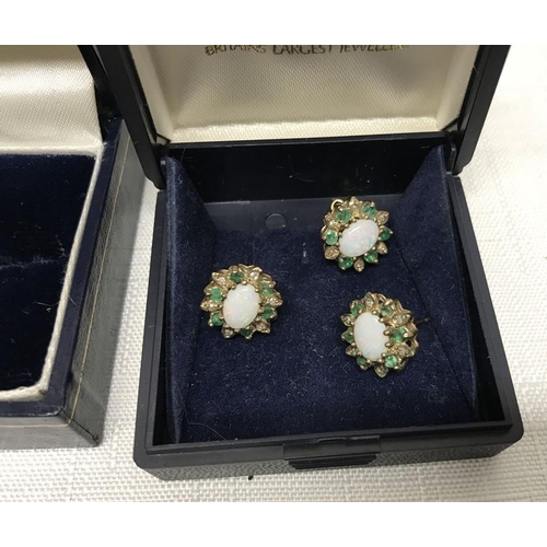 721 - Hallmarked 9ct gold ring and matching set of three stud earrings set with opal surrounded by diamond... 