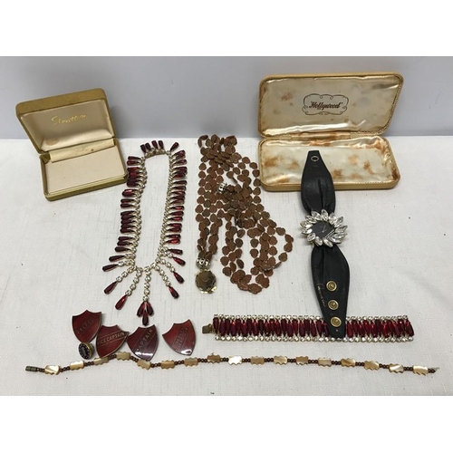 723 - Selection of costume jewellery. Necklace and bracelet set with clear and red stones, two other neckl... 