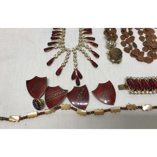 723 - Selection of costume jewellery. Necklace and bracelet set with clear and red stones, two other neckl... 