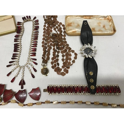 723 - Selection of costume jewellery. Necklace and bracelet set with clear and red stones, two other neckl... 