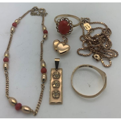 728 - Nine carat gold including two charms, coral and gold bracelet, coral and gold ring, earring back and... 